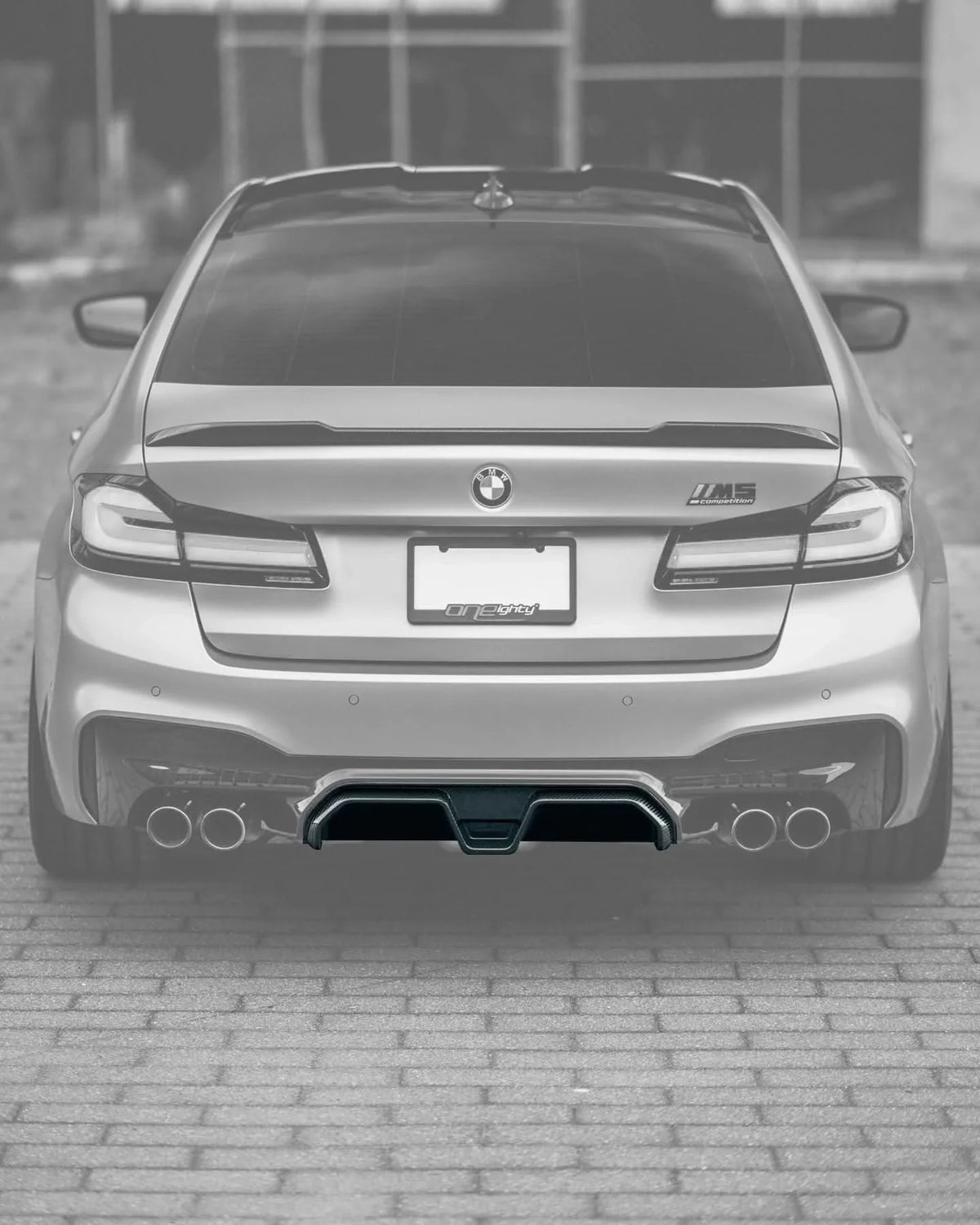 BMW 5 Series F90 M5 CS style carbon fiber rear diffuser by K2 Industries, showcasing sleek, aerodynamic design for 2020+ models.