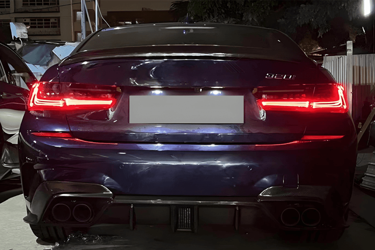 BMW 3 Series G20 G28 tail lights with red and smoked CSL style laser design by K2 Industries, showing close-up of the LED light details.