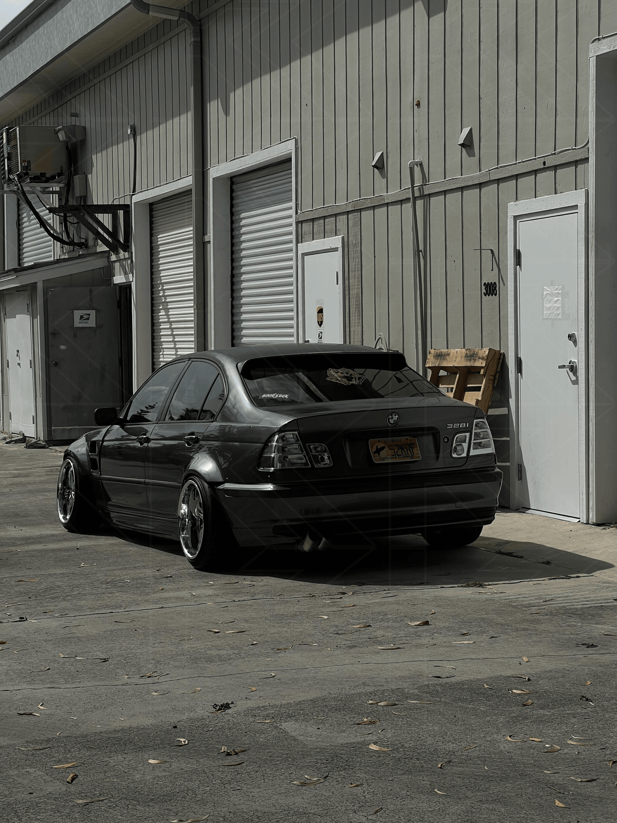 BMW 3-Series E46 sedan clear tail lights by K2 Industries, showing the sleek transparent design for model years 1998-2006.