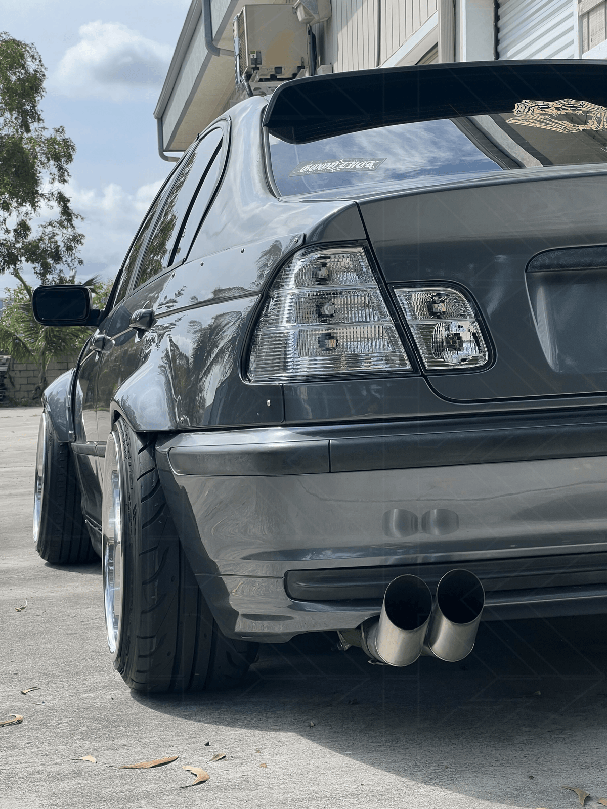 BMW 3-Series E46 sedan clear tail lights by K2 Industries, showing the sleek, transparent design for model years 1998-2006