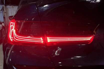 BMW 3 Series G20 G28 tail lights by K2 Industries, red and smoked CSL style laser tail lights installed on 2019-2024 model.