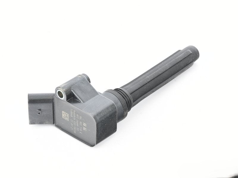 Genuine OEM Audi VW 06L905110K ignition coil for engine, shown with electrical connectors and metal casing.
