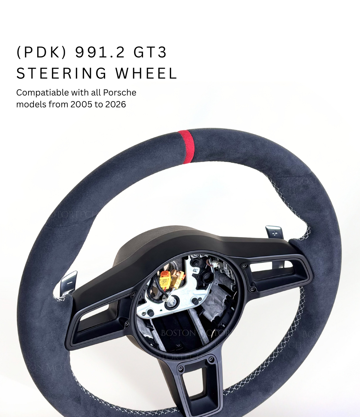 Red Porsche 991.2 steering wheel by Boston Motortech, featuring sporty design and high-quality leather finish.