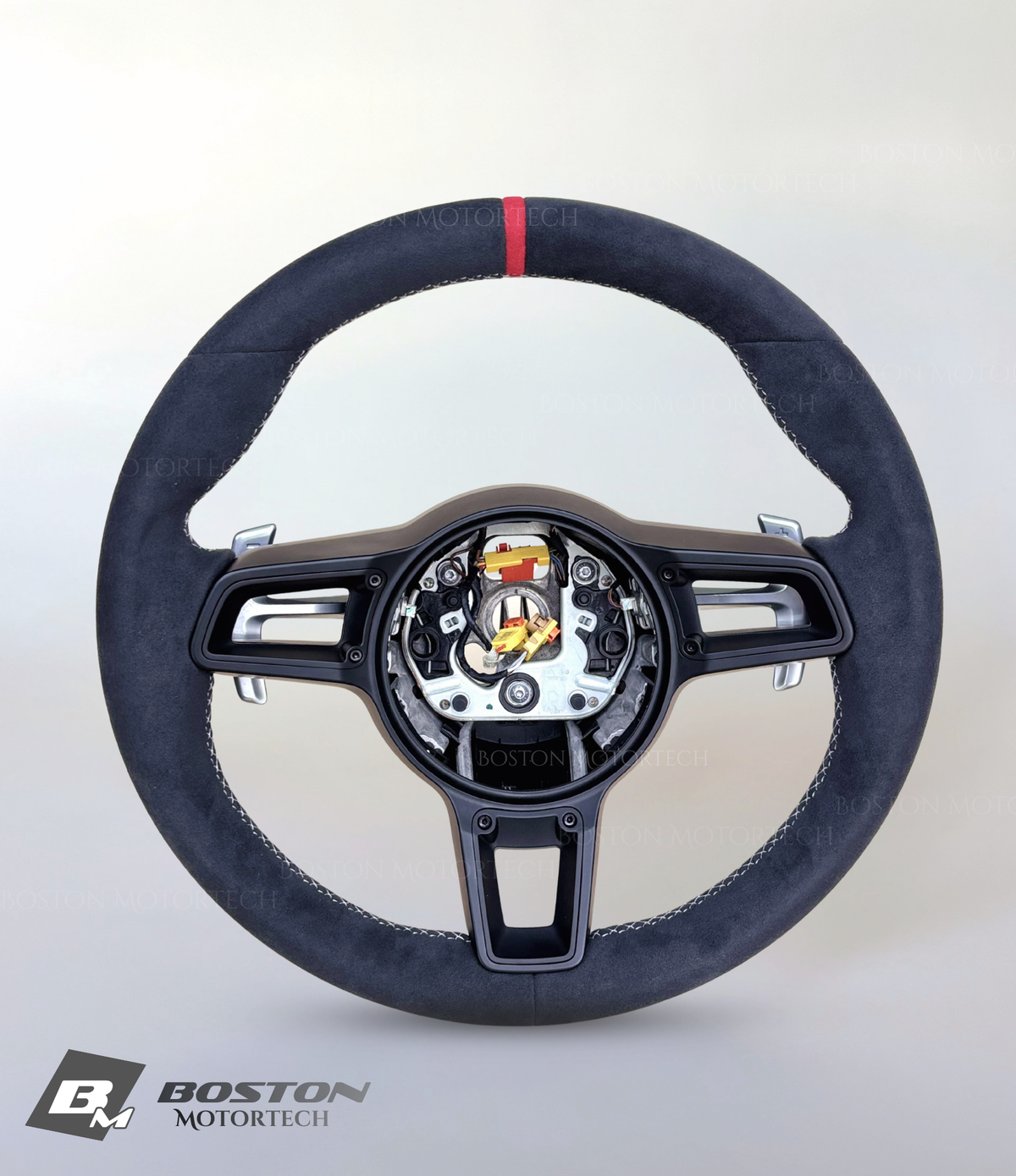 Red PDK Porsche 991.2 steering wheel by Boston Motortech, featuring leather wrapping and sporty design for Porsche 911 interior.