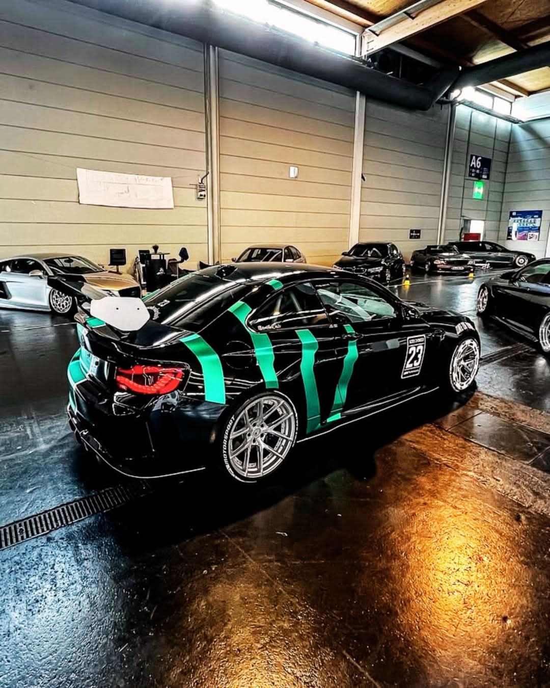 BMW 2 Series and M2 GTS style OLED tail lights by K2 Industries, featuring sleek design and bright illumination for F22, F23, and F87 models.