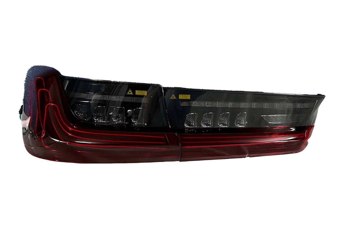 BMW 3 Series G20 G28 tail lights in red and smoked CSL style with laser design by K2 Industries, for 2019-2024 models.