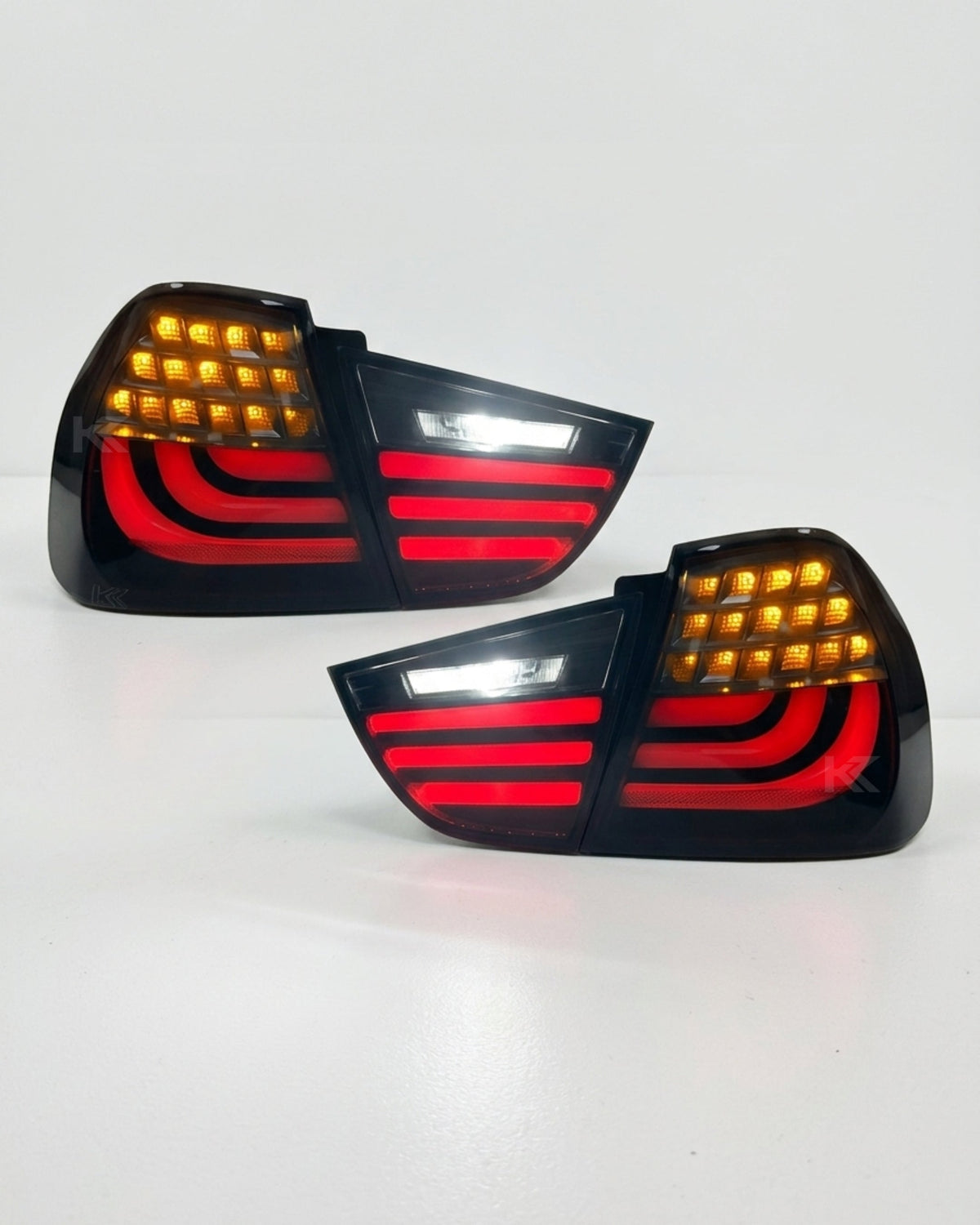 BMW 3 Series E90 upgraded LED tail light assembly by K2 Industries, showing the sleek, modern tail light design for 2009-2012 models.
