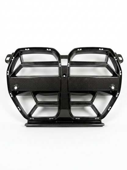 BMW 3 Series M3 G80 M4 G82 CSL style carbon fiber front grille by K2 Industries, showcasing the sleek, lightweight design.
