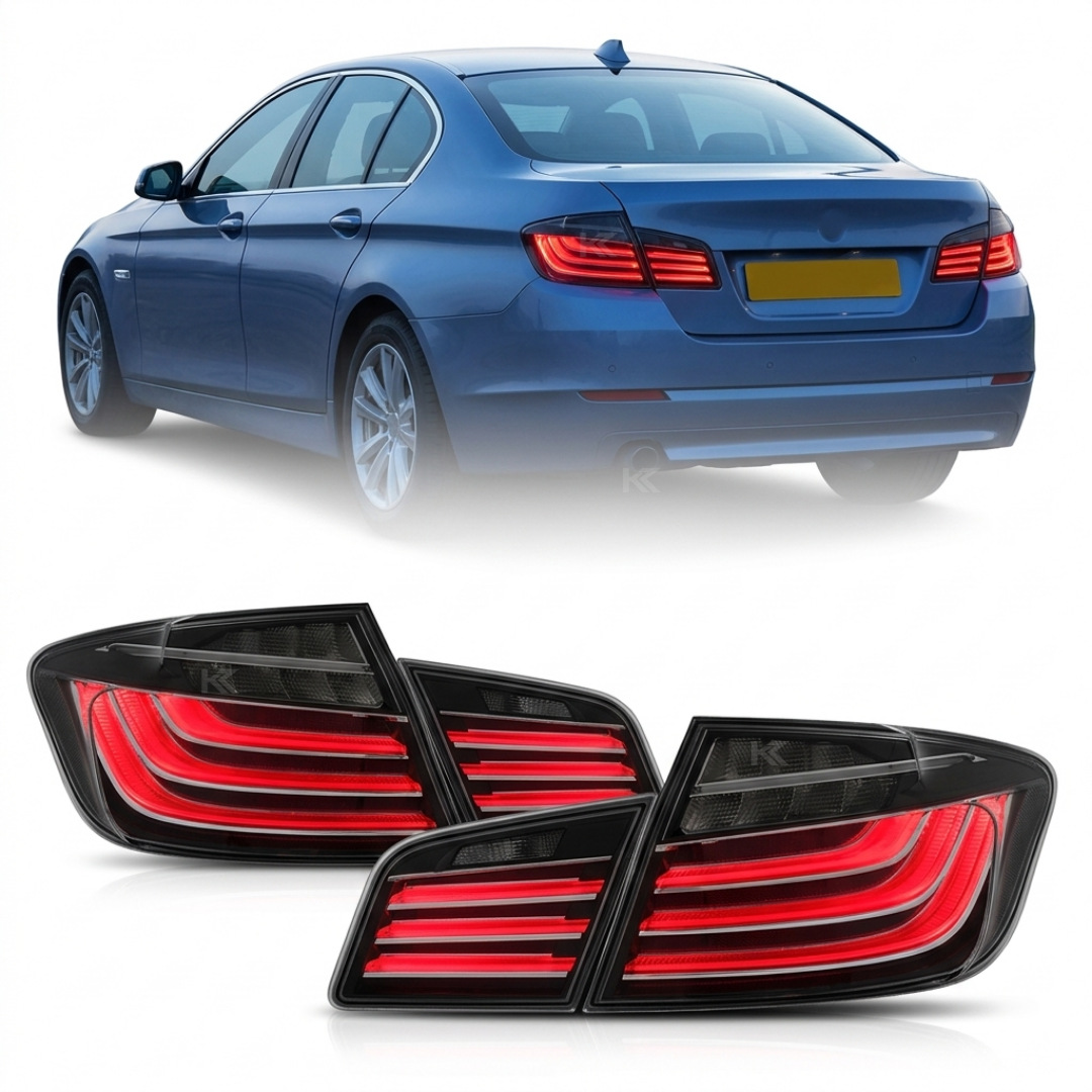 Black LED tail lights for BMW 5 Series F10 (2011-2017) by K2 Industries, showcasing sleek black design and modern lighting elements.