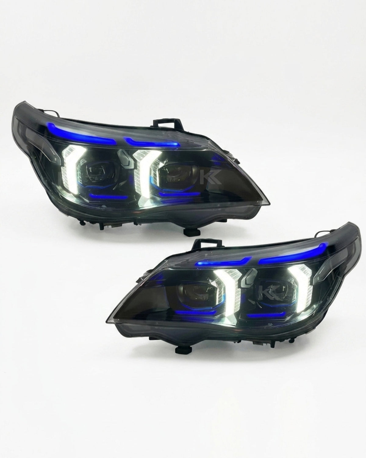 BMW 5 Series E60 headlight assembly with dual-color LED daytime running lights and snake eye design by K2 Industries.
