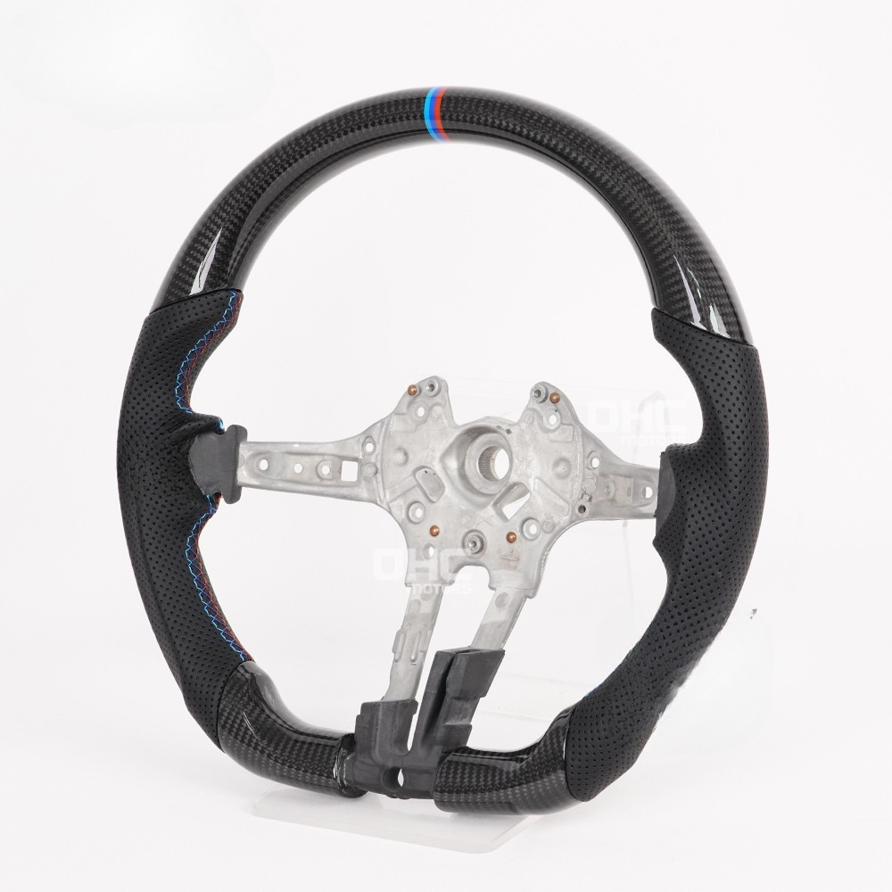 Vekto carbon fiber steering wheel for BMW F30 F-Series, close-up view showing textured carbon fiber surface and ergonomic design.