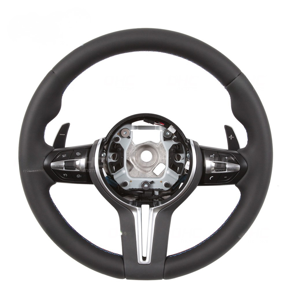 Vekto BMW E90/E91/E92/E93 M3 and E70/E71/E72 E84 X1 M Performance steering wheel showing premium leather grip and sporty design.