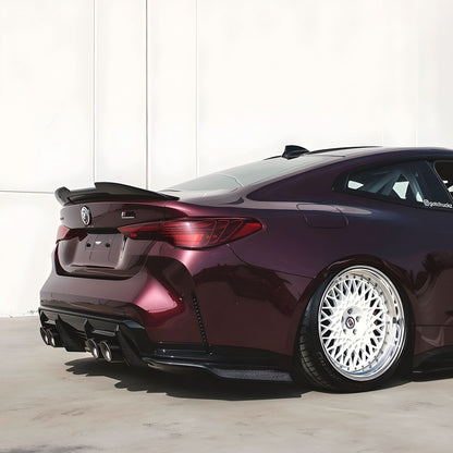 BMW 4 Series G22 G82 M4 PSM Style carbon fiber trunk spoiler by K2 Industries, showcasing sleek aerodynamic design on the car's rear.