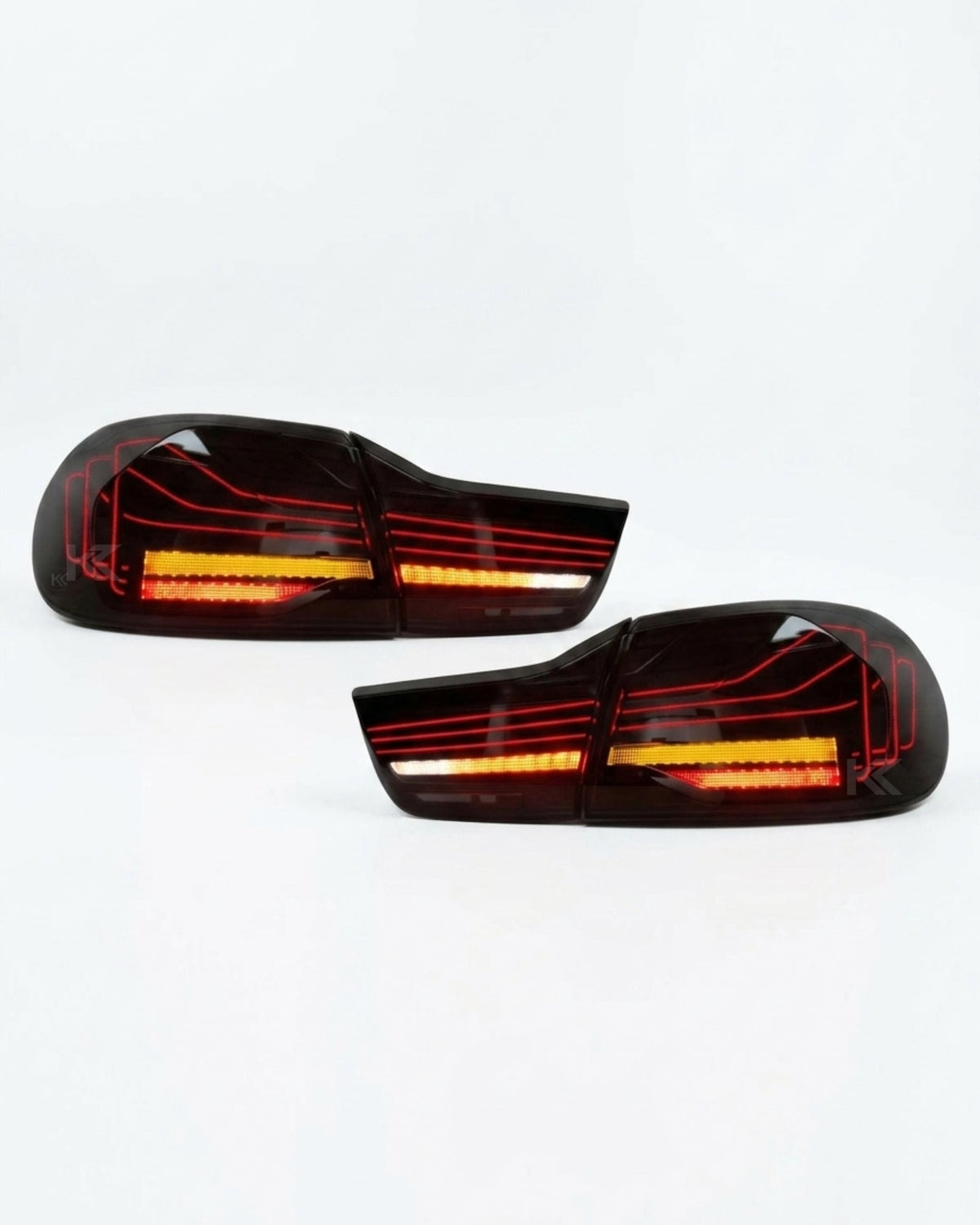 BMW 4-Series F32 F82 430i CSL style LED tail lights installed on the rear of the vehicle, showcasing sleek design and bright illumination.