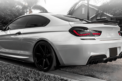 BMW 6 Series F12 F13 F06 smoke and red GTS OLED style tail lights by K2 Industries, with sleek design and LED accents.