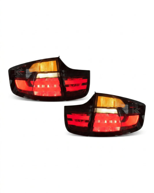 BMW X6 E71 tail lights with red and smoked LED upgrades by K2 Industries, showing the sleek design and lighting features.