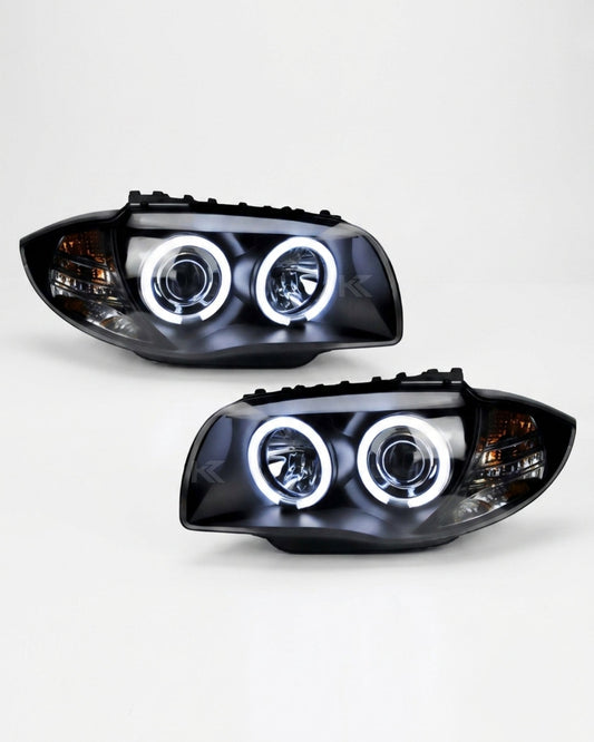 BMW 1 Series 120i 118i E87 headlights with angel eyes LED lights, branded by K2 Industries, showing the front view of the headlights.
