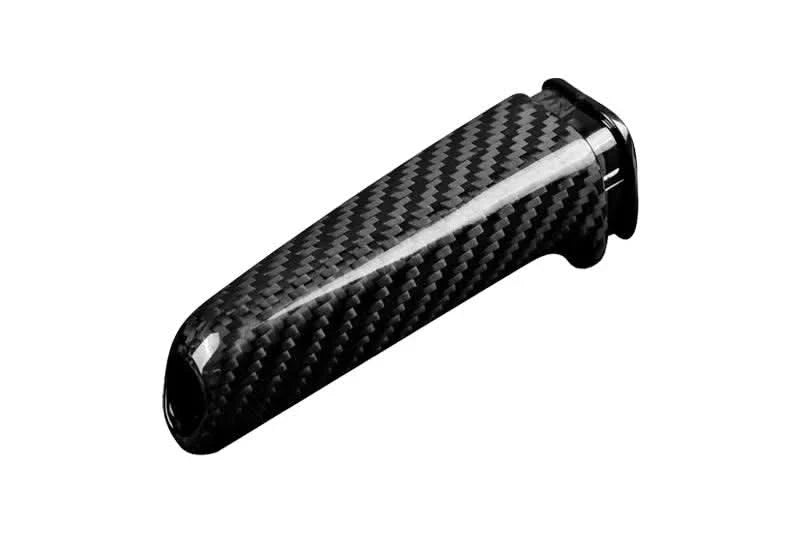 BMW carbon fiber handbrake lever cover by K2 Industries, showcasing a sleek black carbon fiber finish on the handbrake lever.