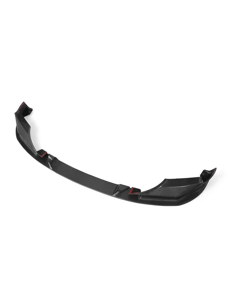 BMW 5 Series F90 M5 3D Style carbon fiber front lip by K2 Industries, showcasing sleek, textured design on a black car bumper