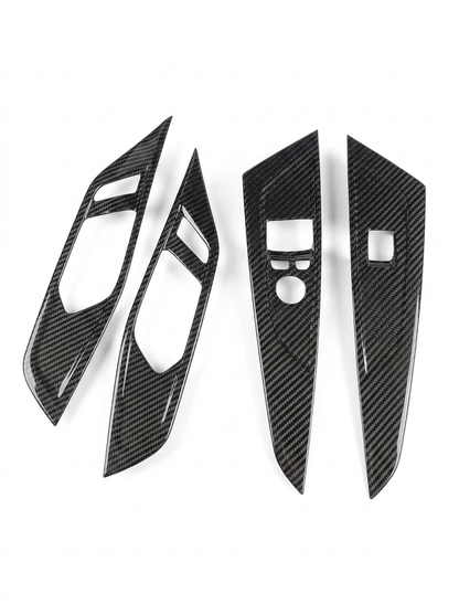 BMW 4 Series G82 G22 carbon fiber interior door trim set by K2 Industries, featuring sleek, textured carbon fiber panels inside the car.