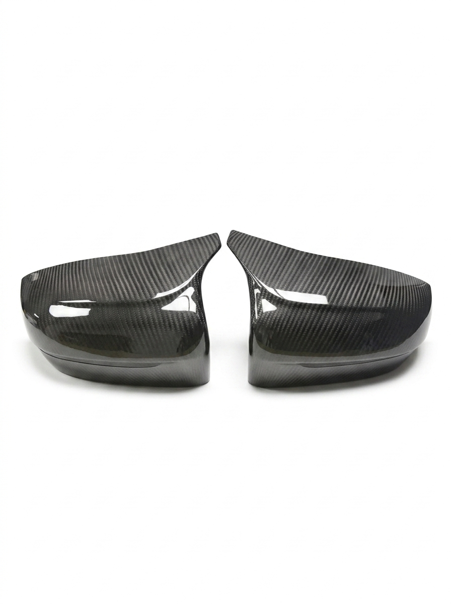 BMW 5 Series F90 M5 carbon fiber side mirror cover by K2 Industries, featuring sleek black finish and aerodynamic design.