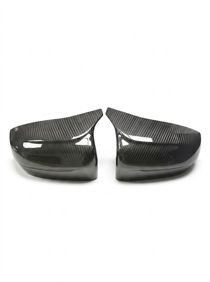 BMW 5 Series F90 M5 carbon fiber side mirror cover by K2 Industries, featuring sleek black finish and aerodynamic design.