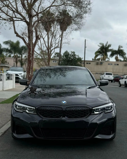 K2 Industries carbon fiber side mirror housing for BMW 2 Series G87 and 3 Series G20/G28 M3 style, sleek carbon fiber finish.
