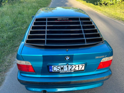 Black windshield louvers for BMW E36 Compact Series 3 by K2 Industries, rear window vent covers for 1992-1999 models.