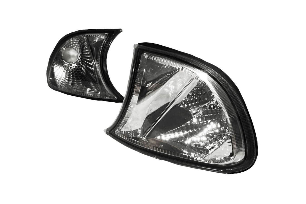 BMW E46 3 Series and M3 crystal clear corner lights by K2 Industries, screw-on JDM style for improved visibility.