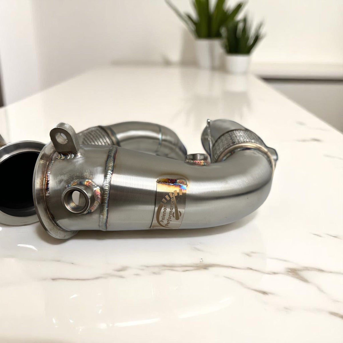 BMW N63R & N63B catless race downpipes for M550i, 750i, M850i, X5, X6, X7 by Palenon Performance, shown on engine bay.