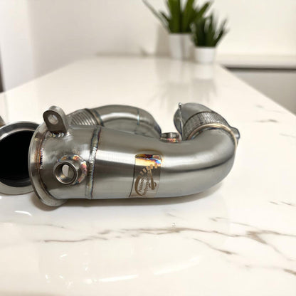 BMW N63R & N63B catless race downpipes for M550i, 750i, M850i, X5, X6, X7 by Palenon Performance, shown on engine bay.