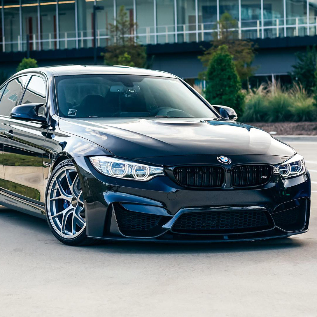 Carbon fiber grille for BMW F80 M3, F82 M4, F32, and F33 from Palenon Performance, showing close-up of sleek black CF design.