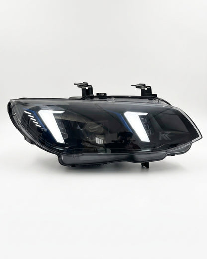 K2 Industries BMW M3 E92/E93 snake eye LED headlight assembly with dual-color daytime running lights for 2010-2013 3 Series models.
