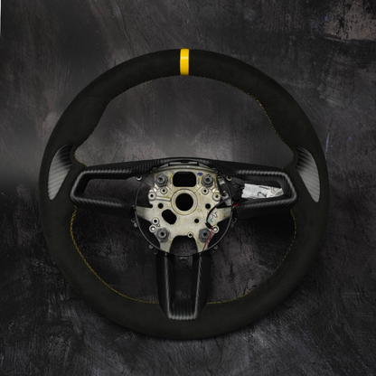 Custom Porsche 911 (992), Taycan, Macan steering wheel by Exclusive Steering, showcasing premium leather and stylish design.