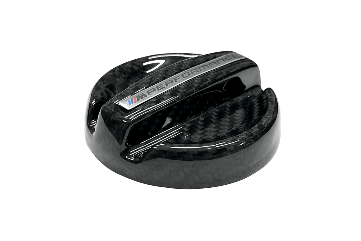 BMW MPerformance carbon fiber engine oil cover by K2 Industries, showcasing a sleek, lightweight carbon fiber oil cap for engine upgrade.