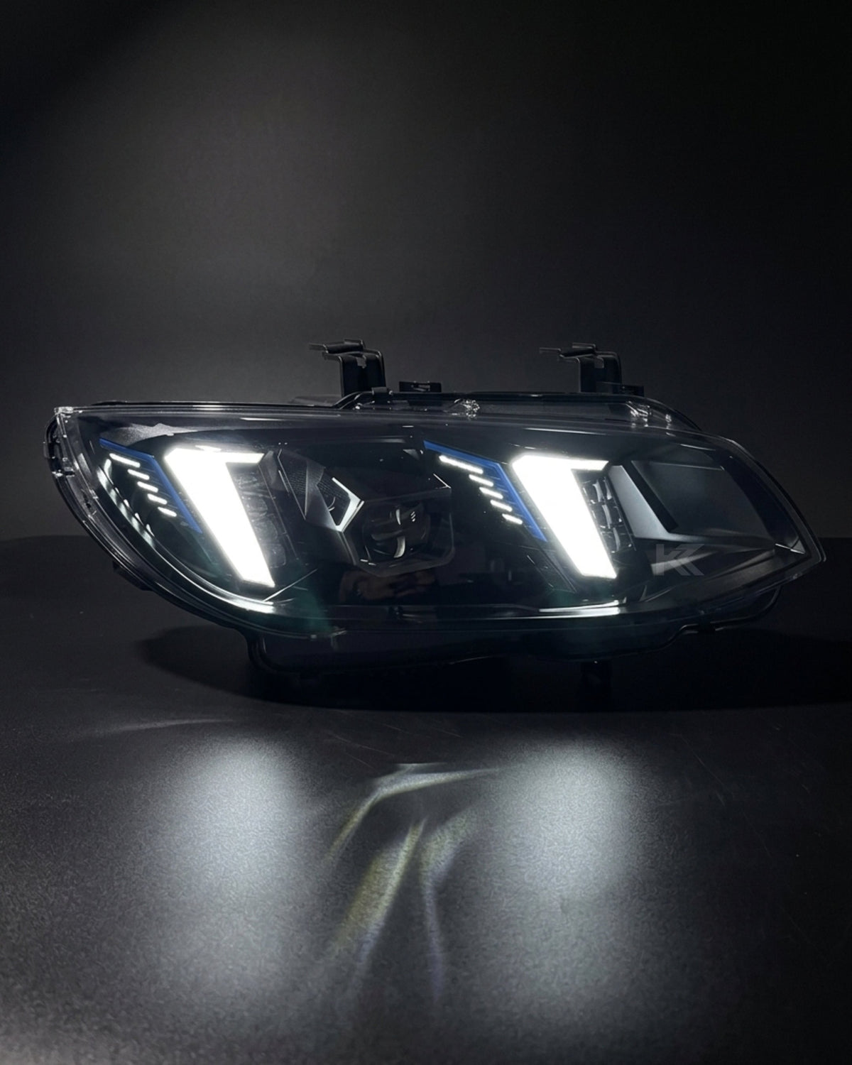 BMW 3 Series M3 E92 E93 LED headlight assembly with dual-color DRL, black housing, and snake eye design for 2010-2013 models.