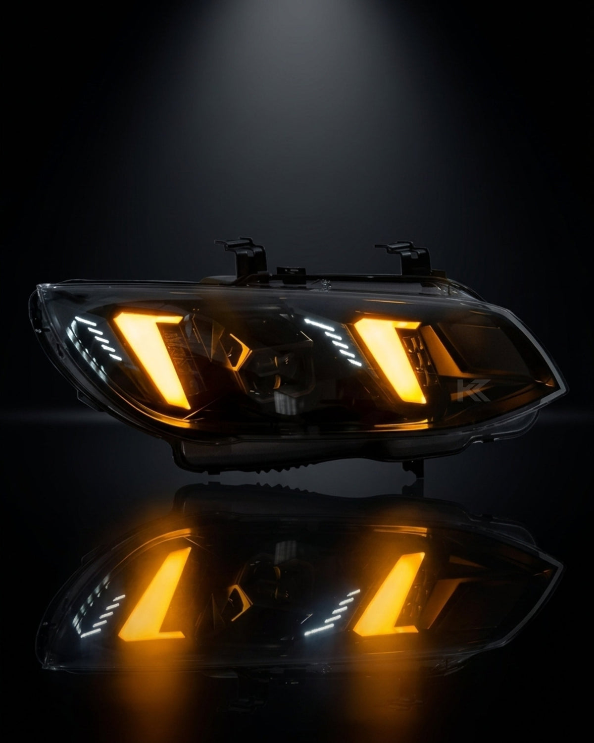 BMW 3 Series M3 E92/E93 LED headlight assembly with dual-color daytime running lights, installed on a 2010-2013 vehicle.