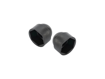 Pair of GoWesty pivot bolt caps for Vanagon rear suspension, showcasing black rubber caps installed on suspension components.