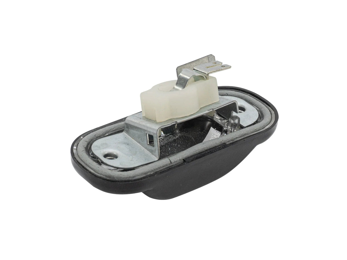 GoWesty Vanagon license plate light bulb holder and lens, showing the clear lens and mounting bracket for vehicle lighting.