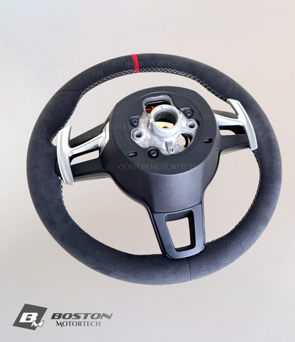 Red Porsche 991.2 steering wheel by Boston Motortech with sporty design and detailed grip, designed for Porsche 911 models.
