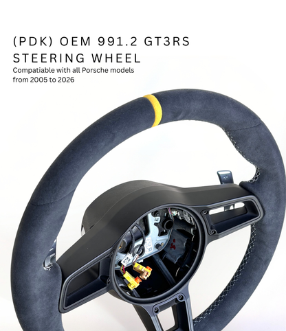 Yellow PDK Porsche 991.2 steering wheel by Boston Motortech, featuring textured grip and multifunction buttons on a sleek design.