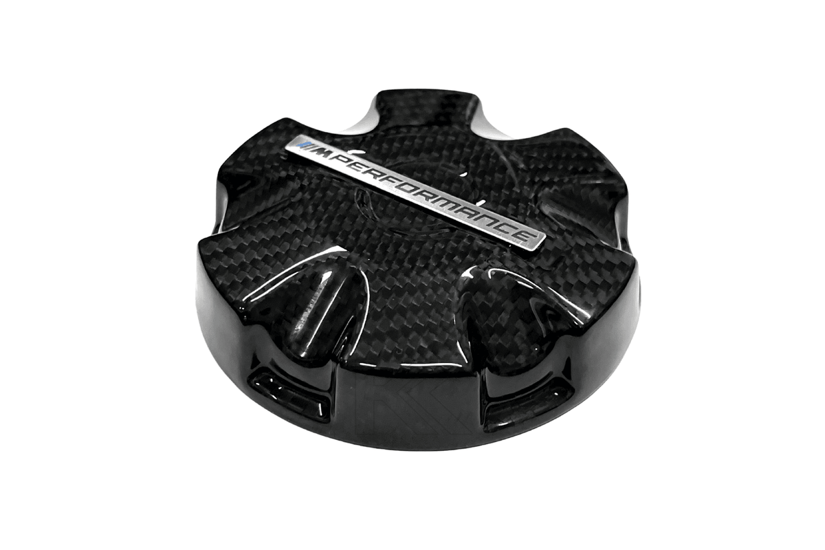 BMW MPerformance Carbon Fiber Radiator Cap Cover by K2 Industries, featuring sleek black carbon fiber design for enhanced engine bay style.
