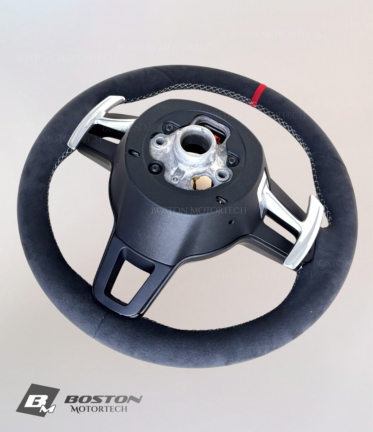 Red PDK Porsche 991.2 steering wheel by Boston Motortech, featuring black grip accents and integrated control buttons.