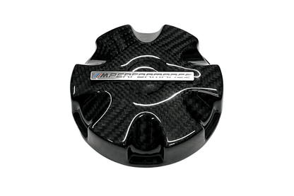 BMW MPerformance carbon fiber radiator cap cover by K2 Industries, showcasing sleek black carbon fiber with detailed branding.