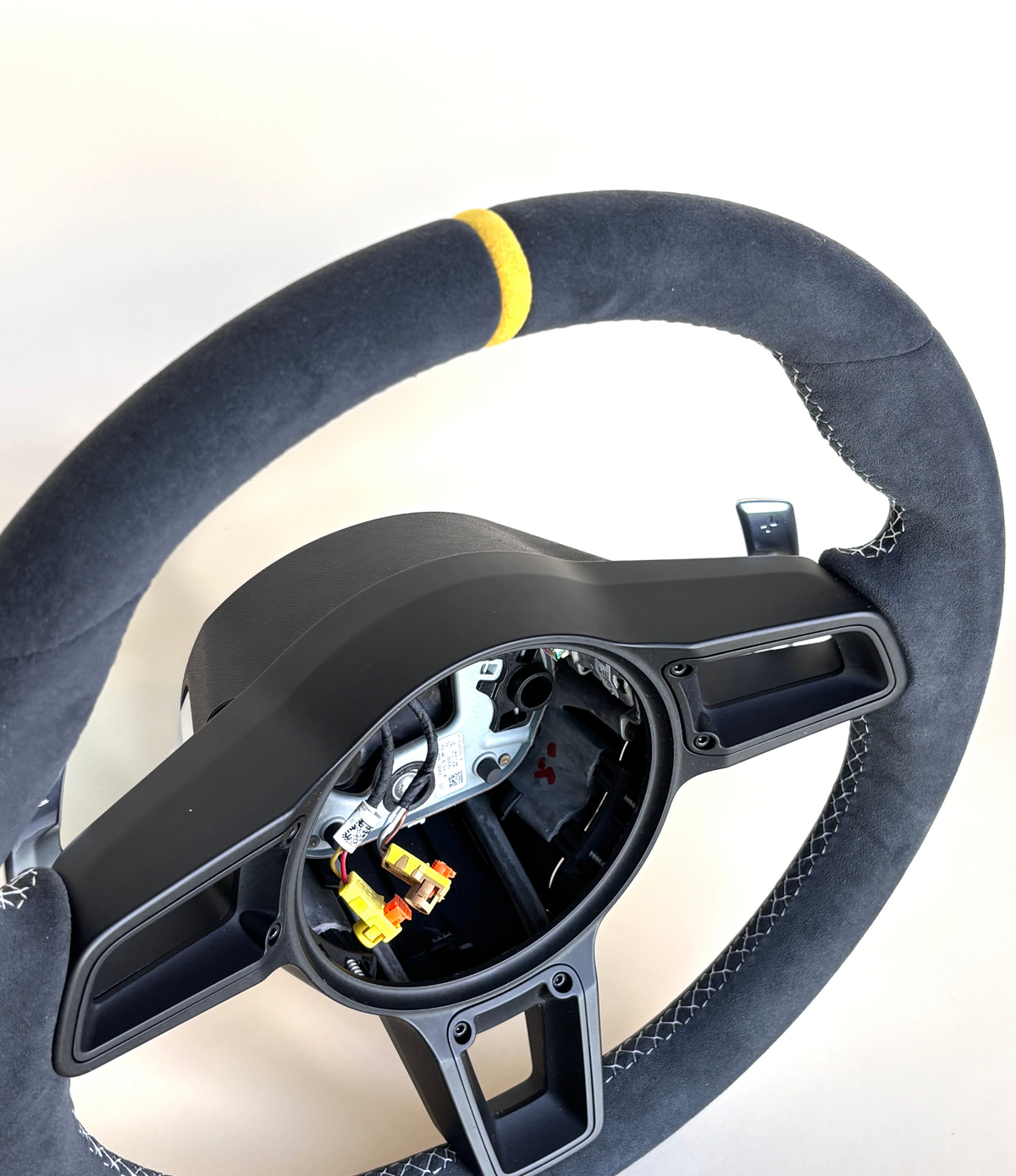 Yellow PDK Porsche 991.2 steering wheel by Boston Motortech with ergonomic grip and detailed design.