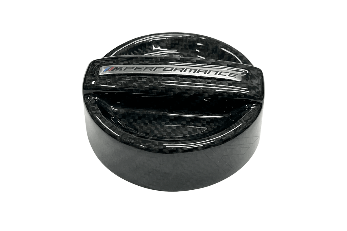 BMW MPerformance carbon fiber engine oil cover by K2 Industries, showcasing a sleek, lightweight carbon fiber oil cap for engine protection.