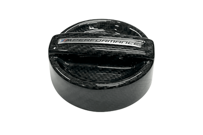BMW MPerformance carbon fiber engine oil cover by K2 Industries, showcasing a sleek, lightweight carbon fiber oil cap for engine protection.