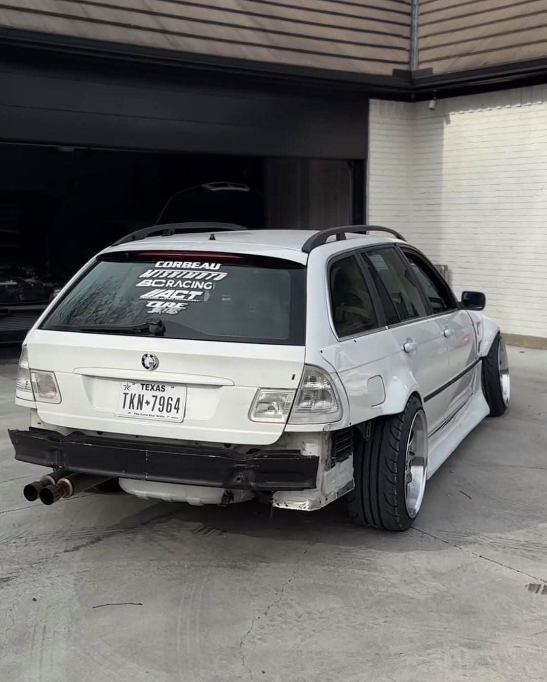 BMW E46 Touring Series 3 wide body kit by K2 Industries, featuring front and rear bumper extensions and side skirts on a white car.