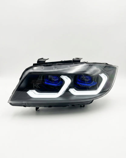 BMW 3 Series E90 LED headlight assembly with dual-color daytime running lights, manufactured by K2 Industries, for 2005-2012 models.