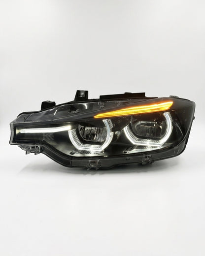 BMW 3 Series F30/F31/F35 V3 smoked LED headlight assembly with white, yellow, and red DRL from K2 Industries, 2012-2018.